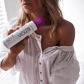 tanned model in MineTan Violet Self Tan Foam